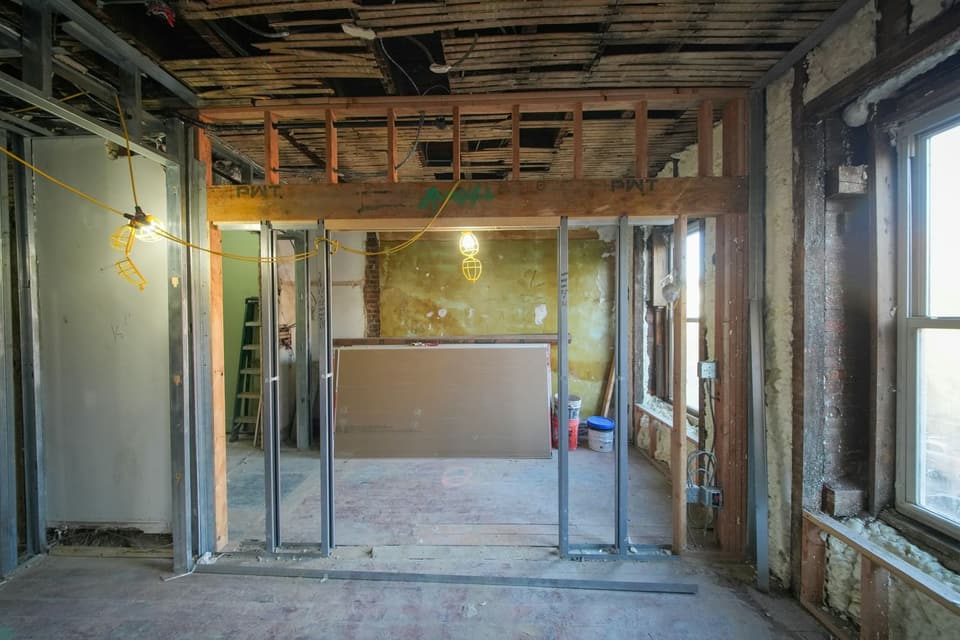 Professional structural reconstruction with framing and staged materials