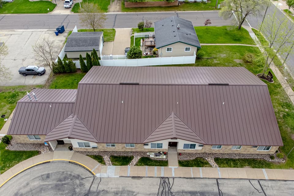 Commercial standing seam metal roof and building envelope